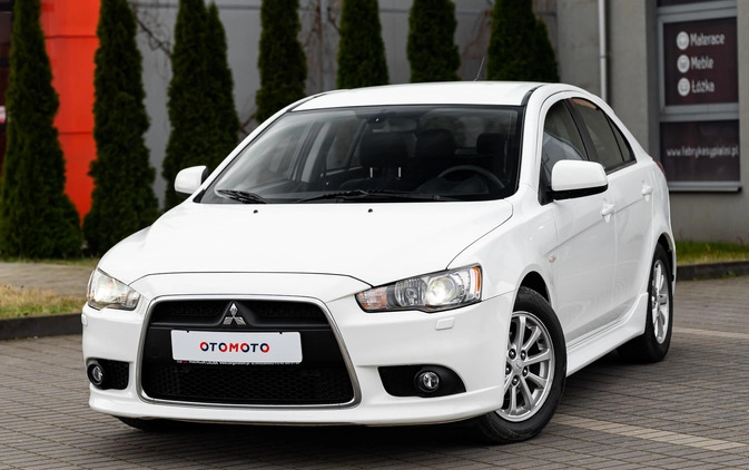 Mitsubishi Lancer cena 32900 przebieg: 150000, rok produkcji 2014 z Radom małe 596
